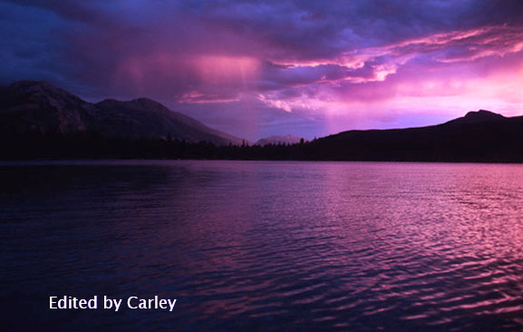 Violet filter added to a mountain sunset photo